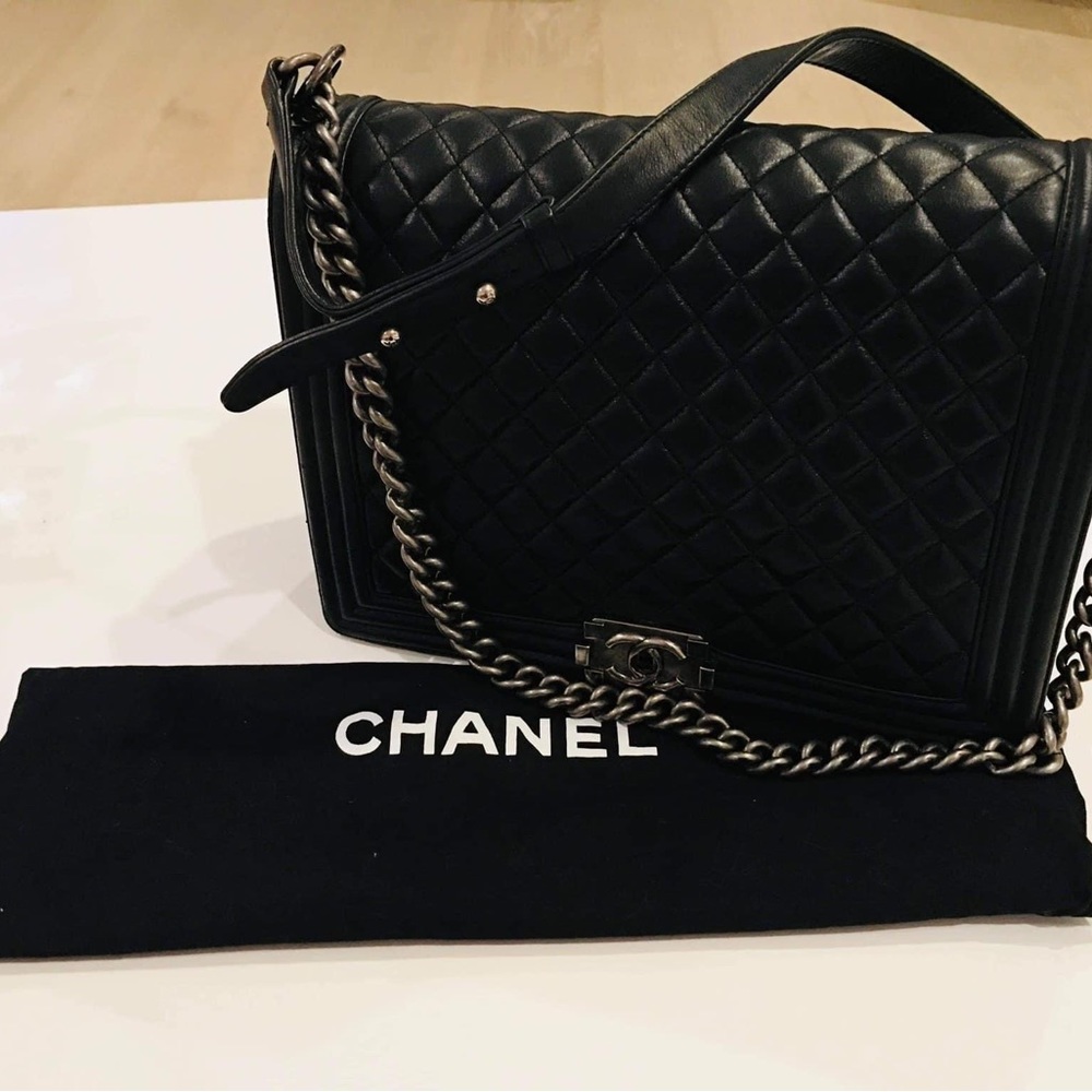 Chanel quilted XL Boy Bag black with gunmetal hardware.